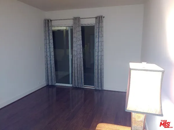 a bathroom with a tub and shower