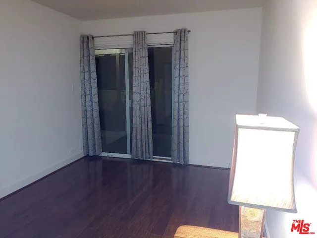 a bathroom with a tub and shower