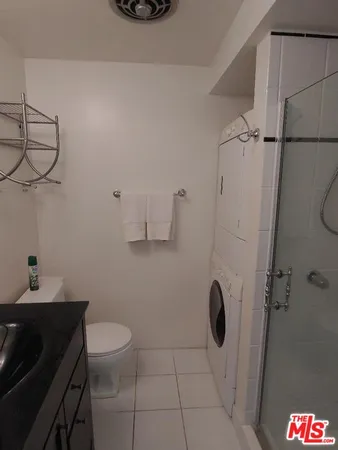 a view of cabinet and mirror