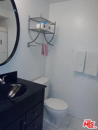 a view of a house with sitting area and garden view