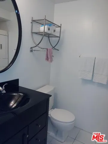 a view of a house with sitting area and garden view