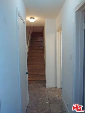 an aerial view of a house with outdoor space