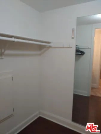 an aerial view of residential house and sandy dunes