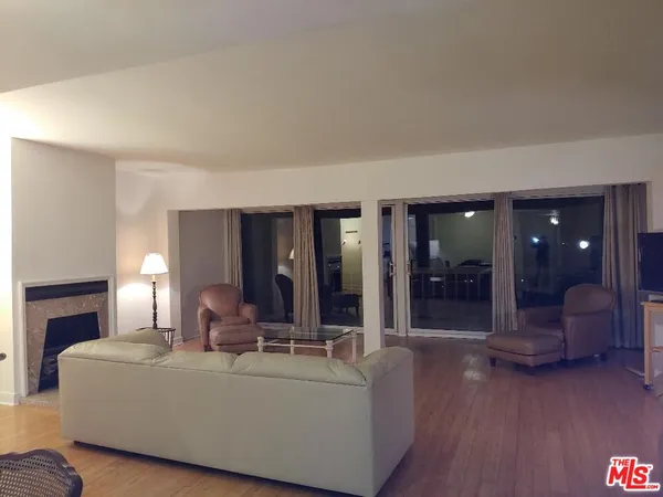 a view of a workspace with furniture