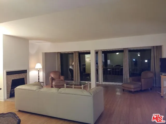 a view of a workspace with furniture