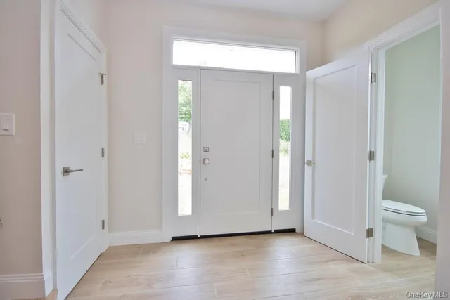 a view of an empty room and a gallery