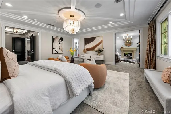 a large bathroom with a double vanity sink a mirror and a bathtub