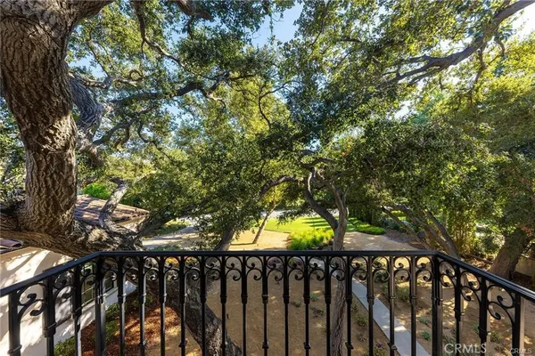 a view of a swimming pool and a yard