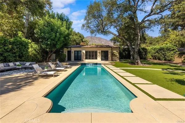 a backyard of a house with lots of green space
