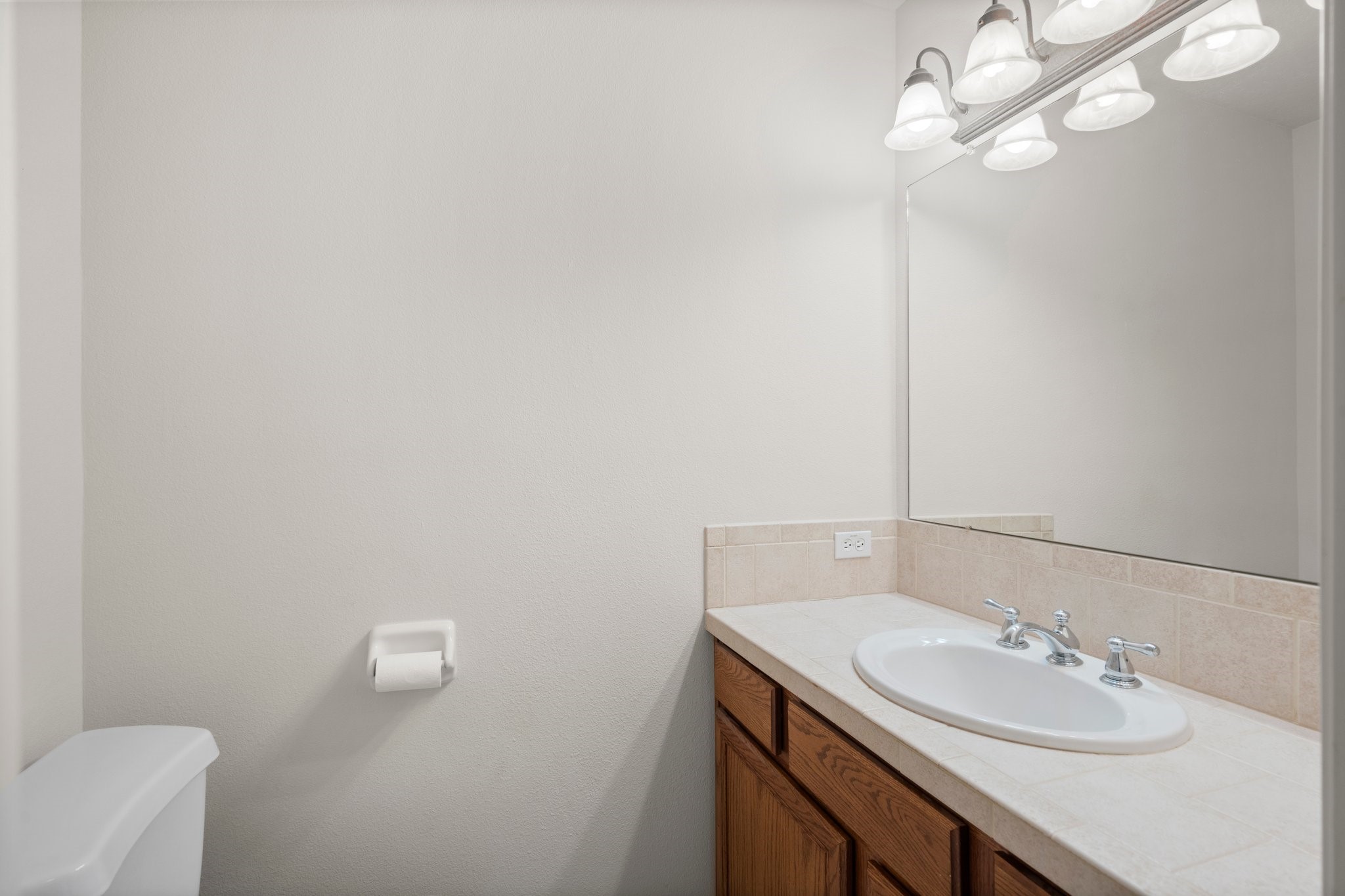34334 Howell Road Waller, TX 77484 - Photo 20 of 37 Functional bathroom with a single sink vanity.\