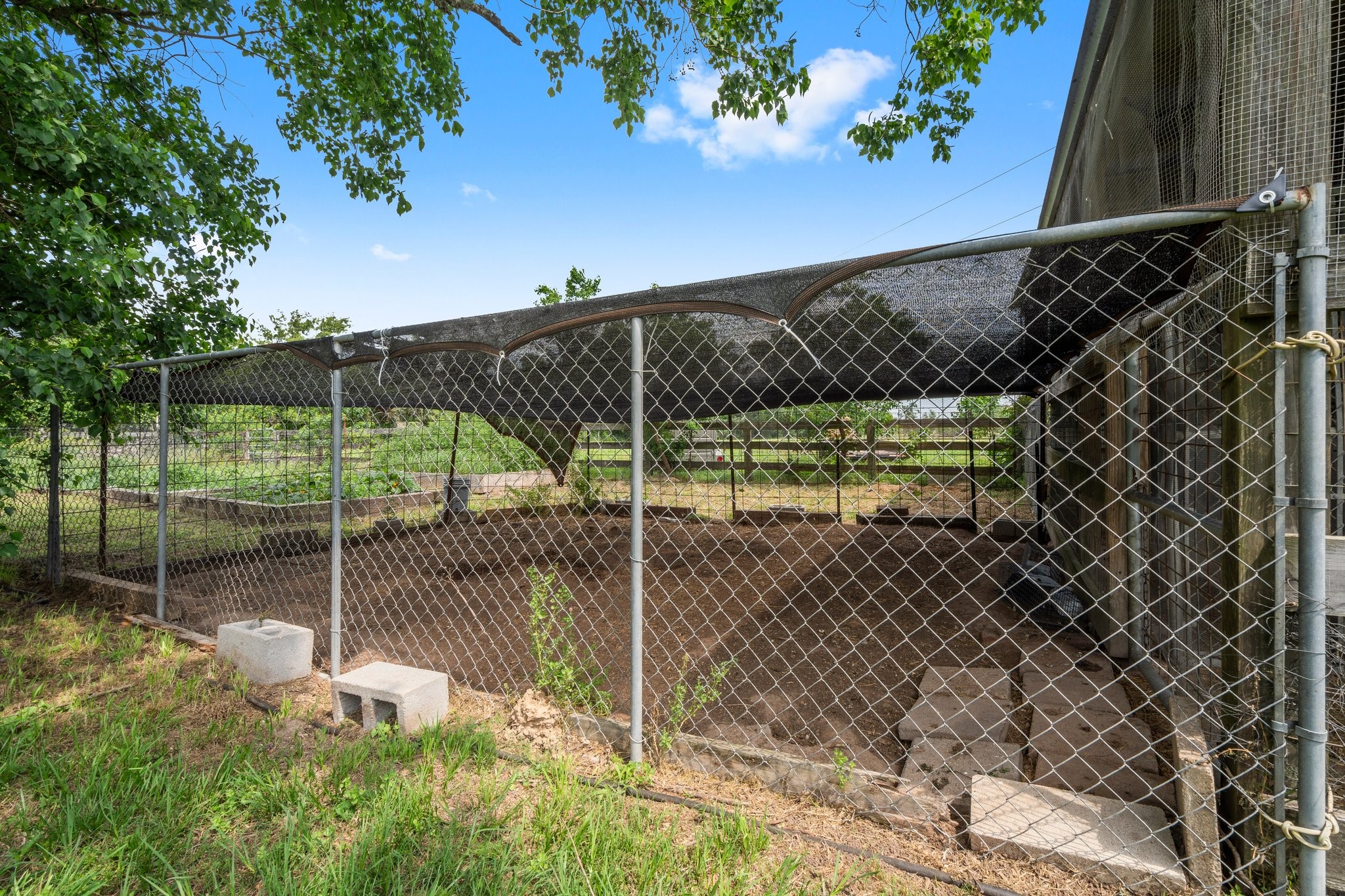 34334 Howell Road Waller, TX 77484 - Photo 28 of 37 Dedicated fenced outdoor area, ideal for gardening or a secure pet enclosure.