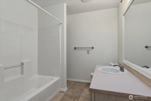 a bathroom with a sink and a bathtub