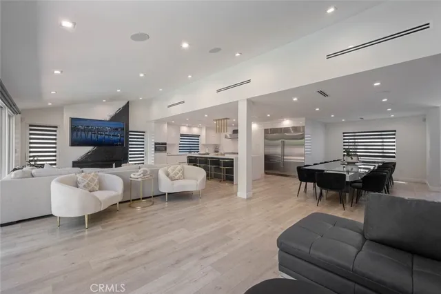 a living room with furniture and a table