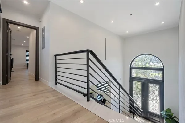 a view of room window and hardwood