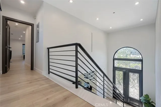 a view of room window and hardwood