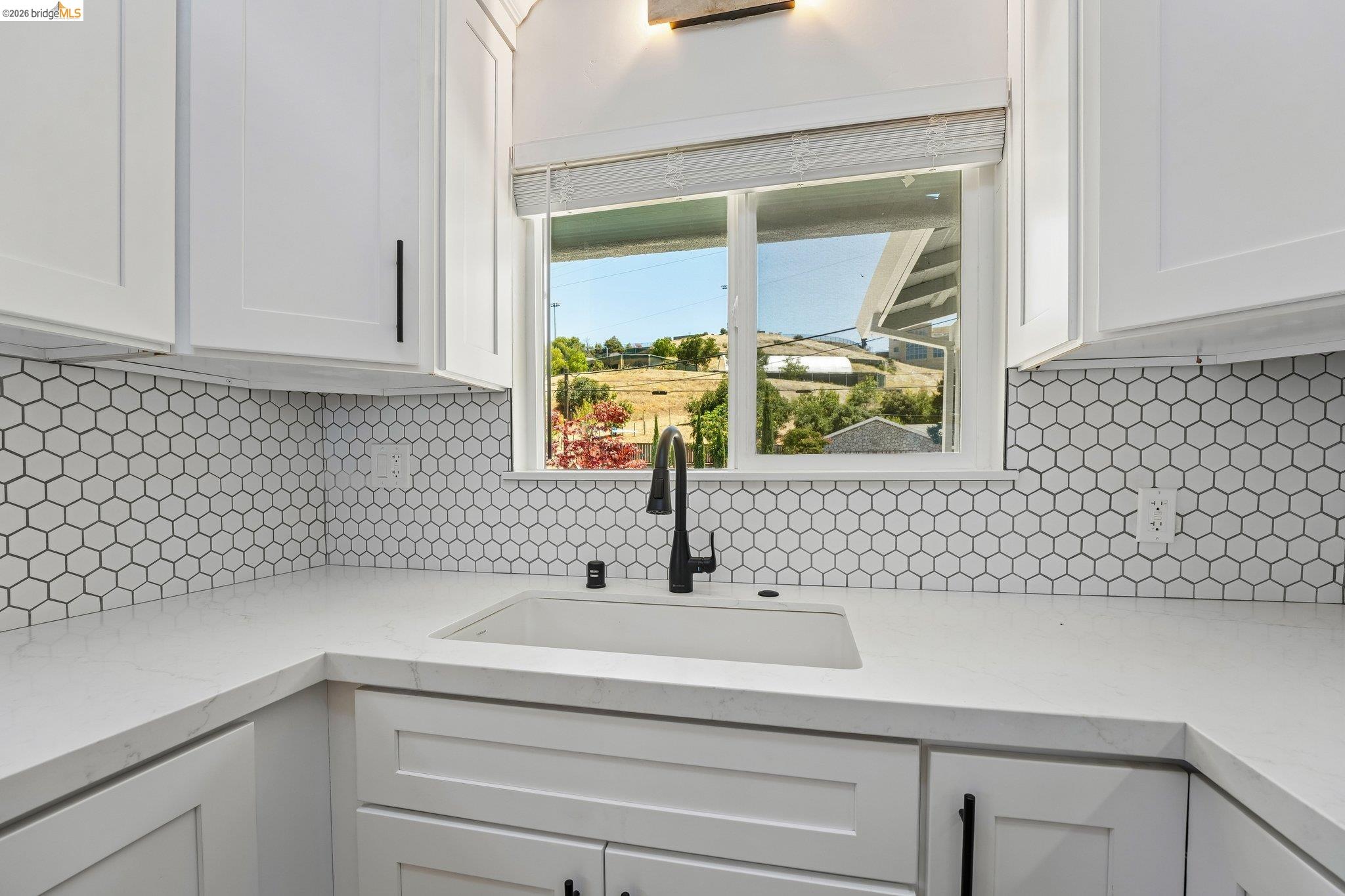 375 Senter Road San Jose, CA 95111 - Photo 32 of 80 a bathroom with a sink and a mirror