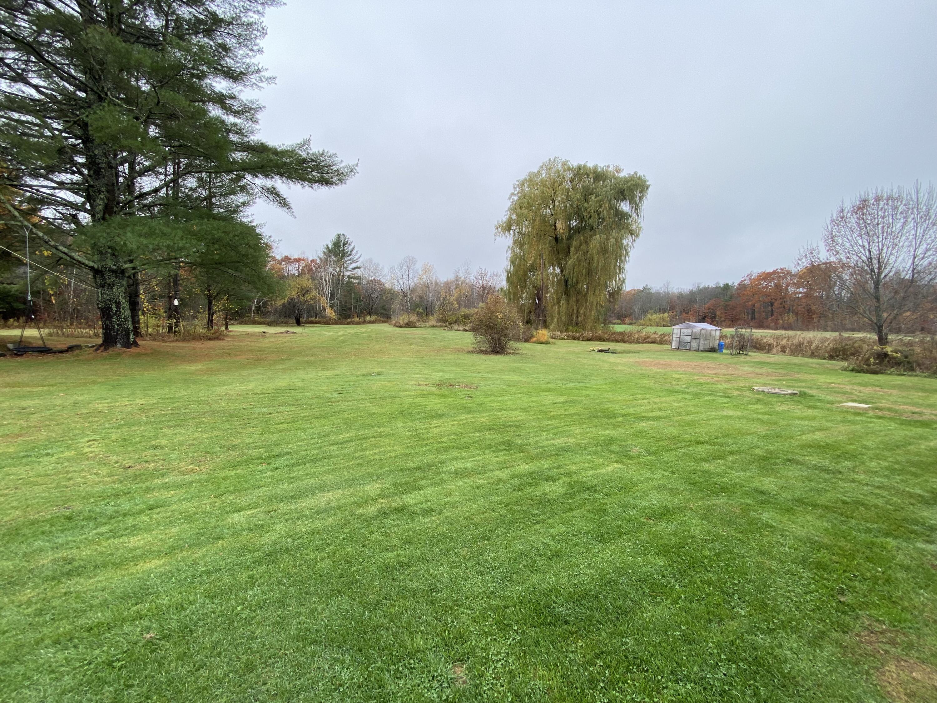 157 Middle Road Fairfield, ME 04937 - Photo 3 of 22 Backyard