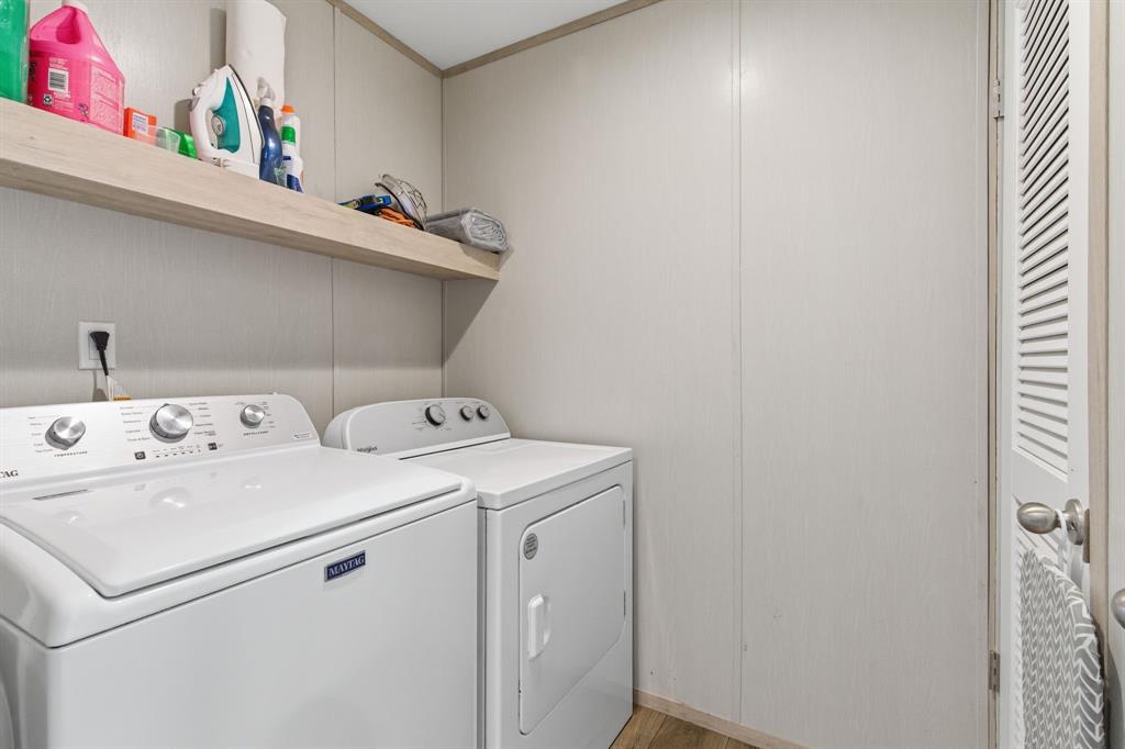 8792 Highway 67 Saltillo, TX 75478 - Photo 9 of 40 a utility room with dryer and washer