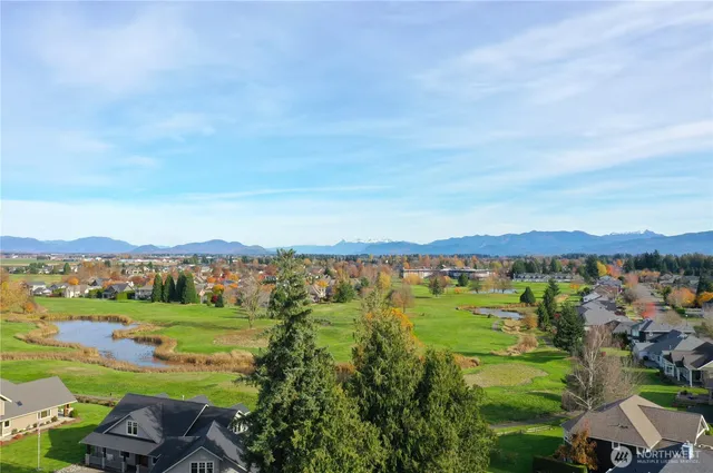 an aerial view of a town with couple of houses