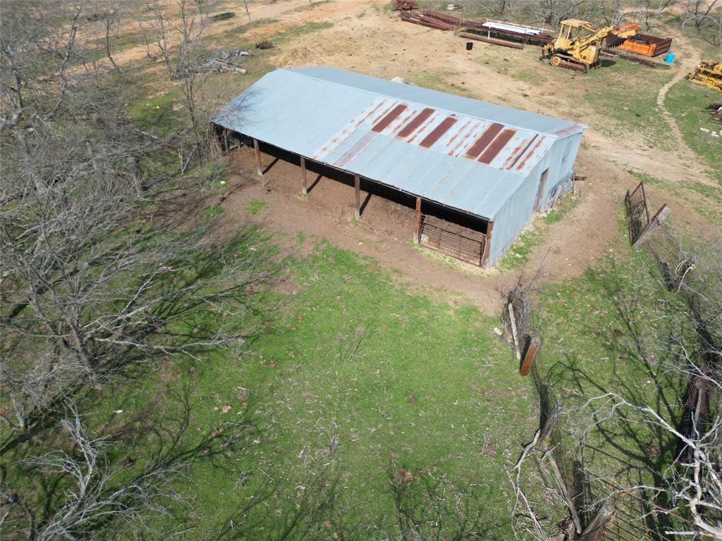 161 East Reno Road Azle, TX 76020 - Photo 3 of 14 a view of a backyard with a patio