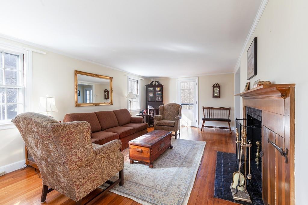 1 Standish Road Wellesley, MA 02481 - Photo 4 of 29 a living room with furniture and a fireplace