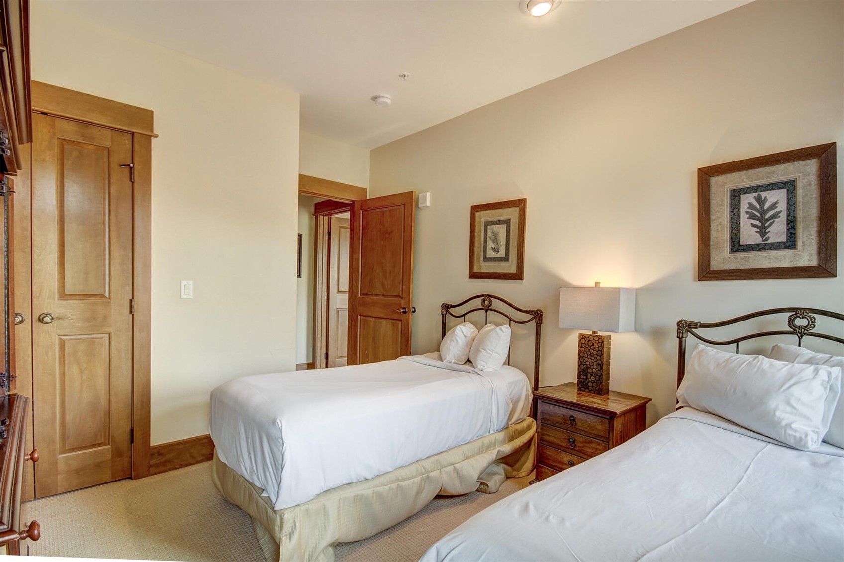 280 Trailhead Drive, Unit 3039 Keystone, CO 80435 - Photo 22 of 38 a bedroom with beds and cupboard
