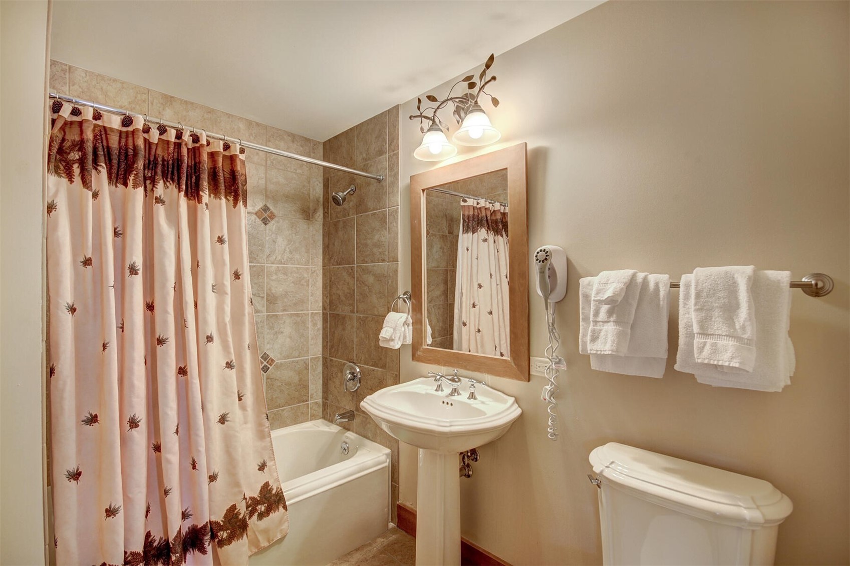 280 Trailhead Drive, Unit 3039 Keystone, CO 80435 - Photo 23 of 38 a bathroom with a sink toilet and shower