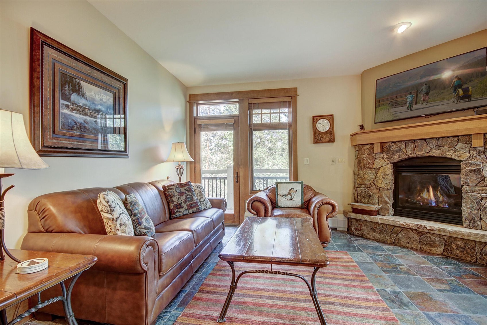280 Trailhead Drive, Unit 3039 Keystone, CO 80435 - Photo 6 of 38 a living room with furniture and a fireplace