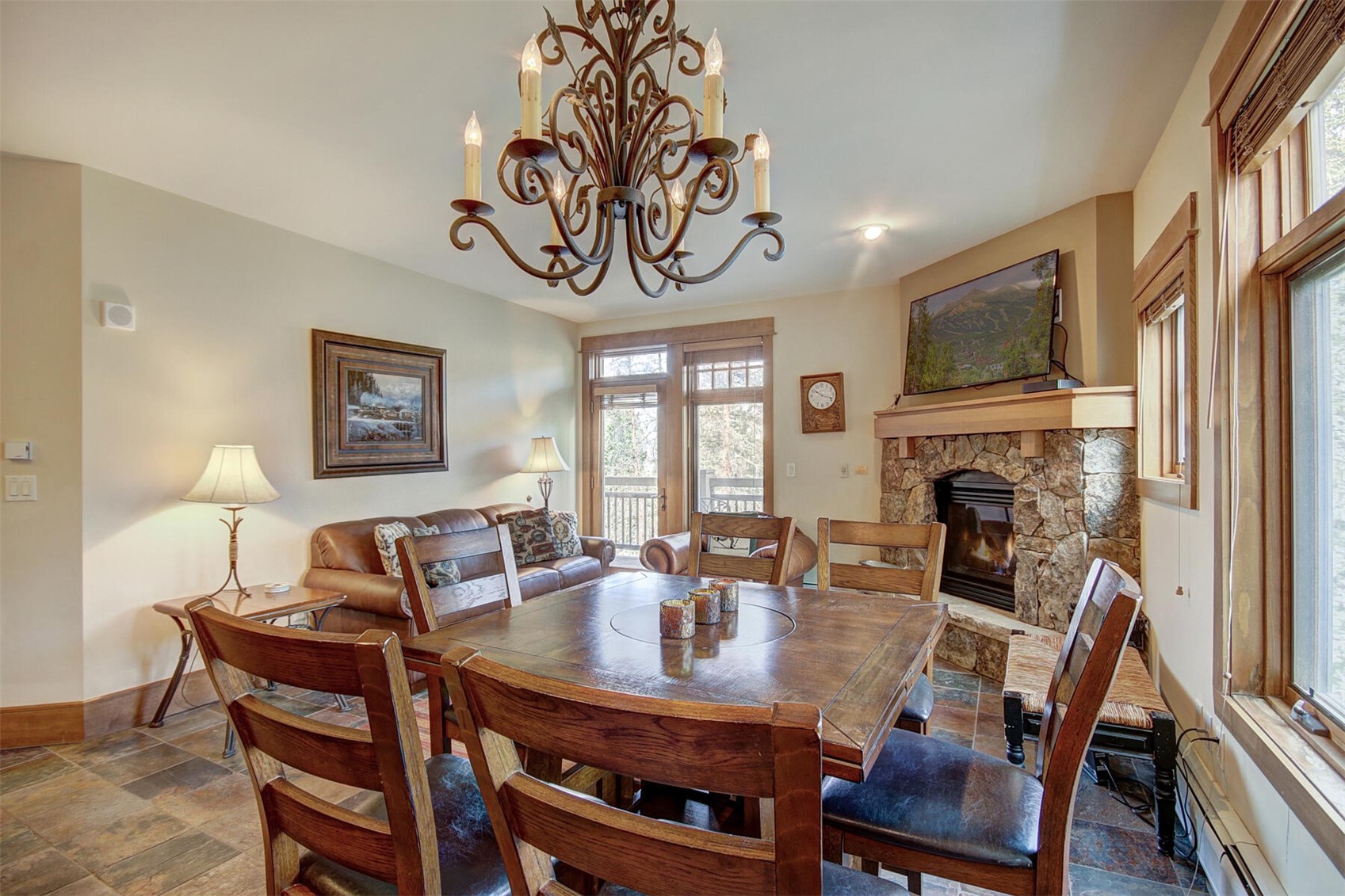 280 Trailhead Drive, Unit 3039 Keystone, CO 80435 - Photo 8 of 38 a view of a dining room with furniture window and wooden floor