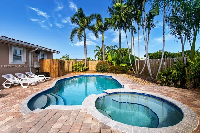 a view of outdoor space yard and swimming pool