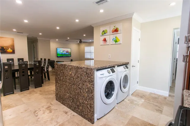 a view of living room with washer and dryer