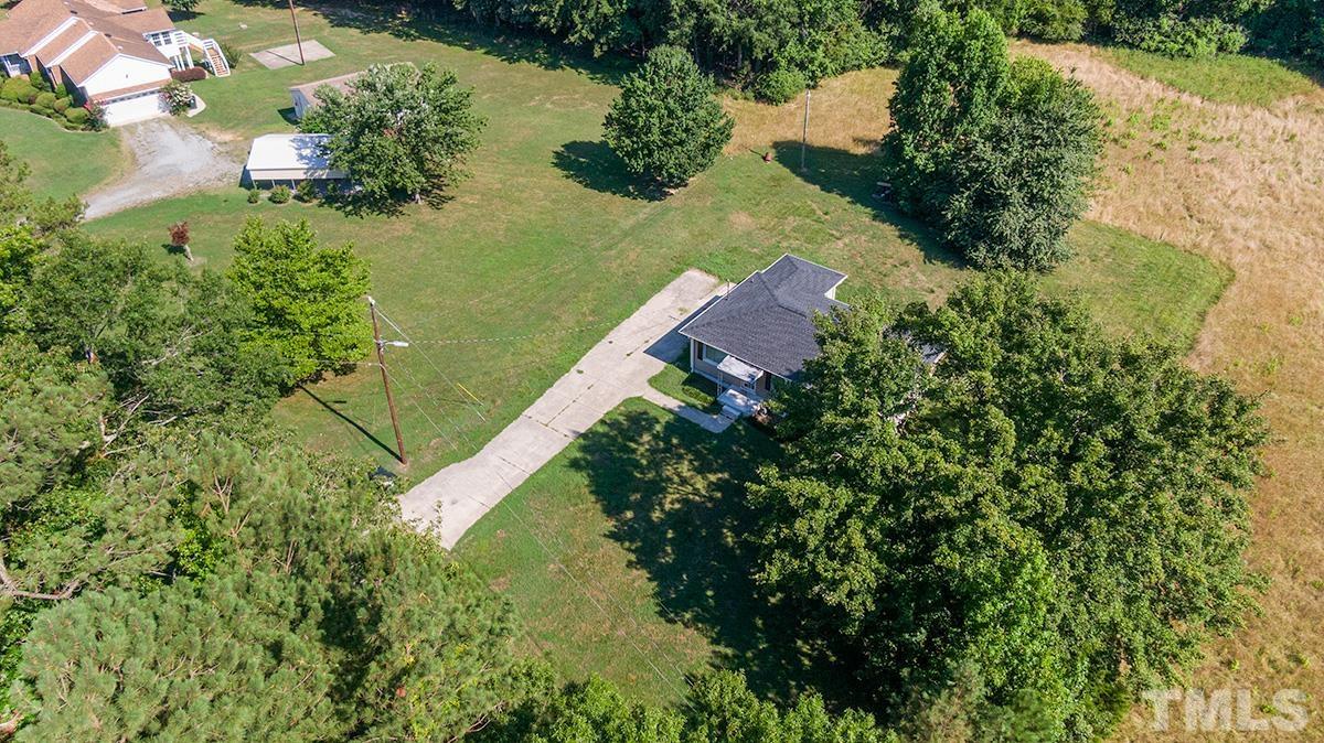 135 Goodwin Road Durham, NC 27712 - Photo 8 of 30 an aerial view of a house with a yard and lake view