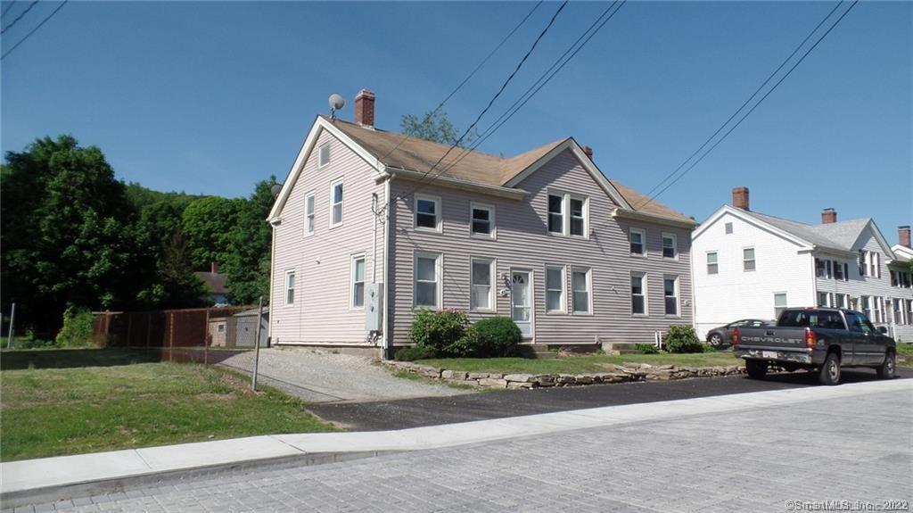 43 River Street Sprague, CT 06330 - Photo 1 of 1 a front view of a house with a garden