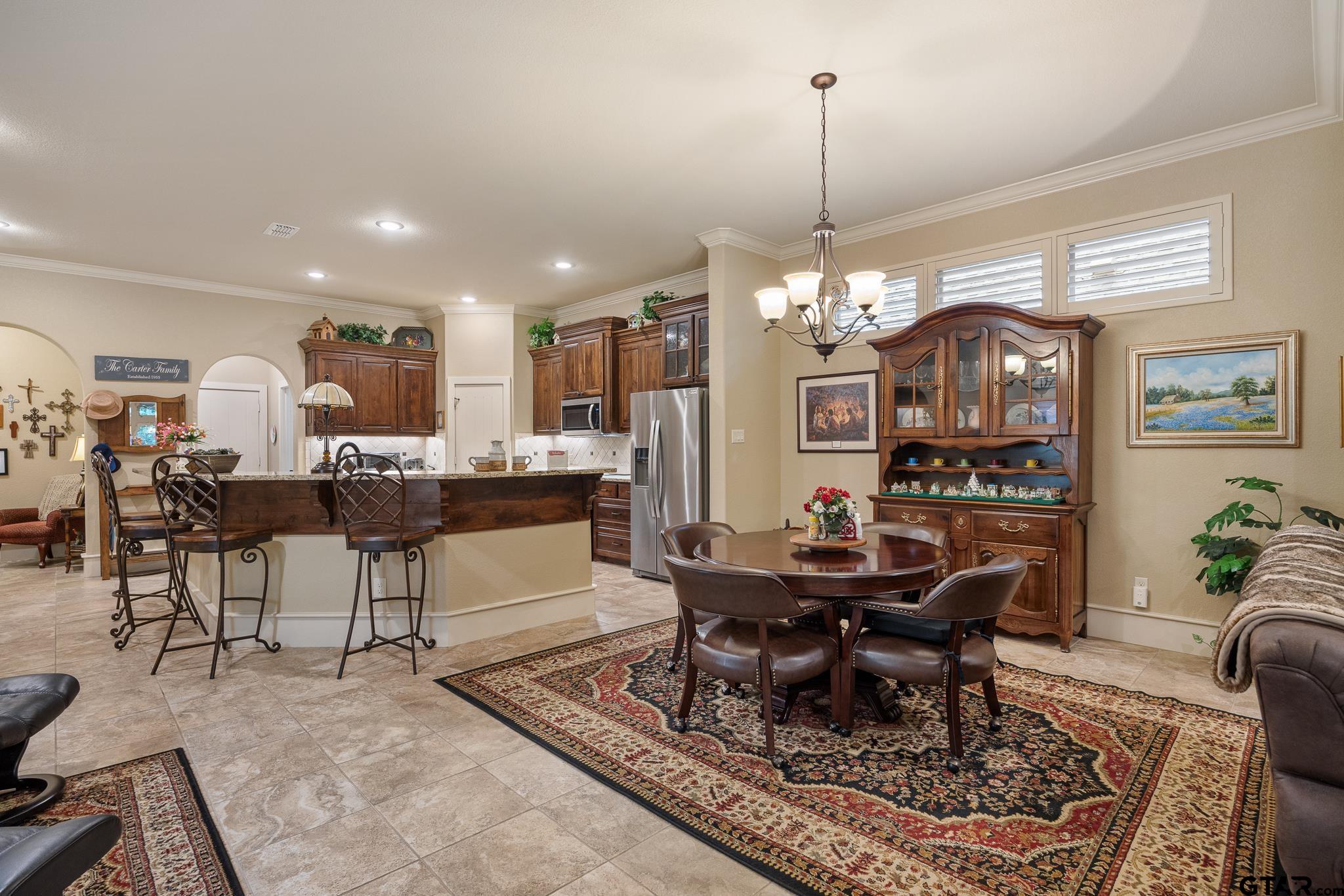 4322 Madera Drive Tyler, TX 75707 - Photo 16 of 32 a view of a dining room with furniture