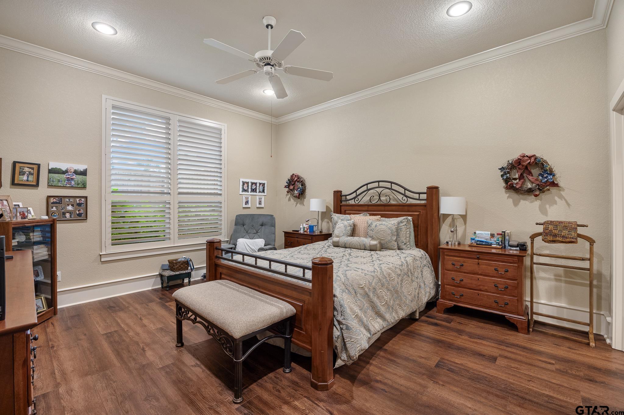 4322 Madera Drive Tyler, TX 75707 - Photo 21 of 32 a bedroom with a bed and a desk
