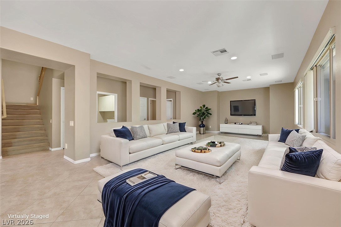 2501 Bechamel Place Henderson, NV 89044 - Photo 12 of 50 A spacious living area features high ceilings and elegant recessed lighting.