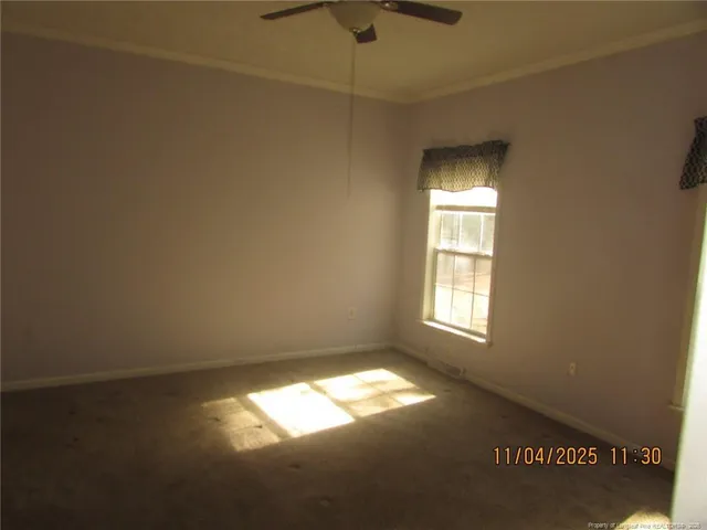 a view of empty room with windows