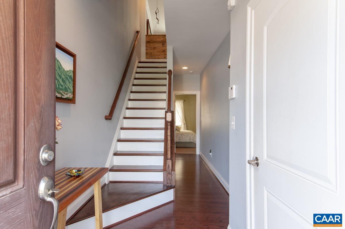 2140 Avinity Loop Charlottesville, VA 22902 - Photo 16 of 26 a view of an entryway with wooden floor