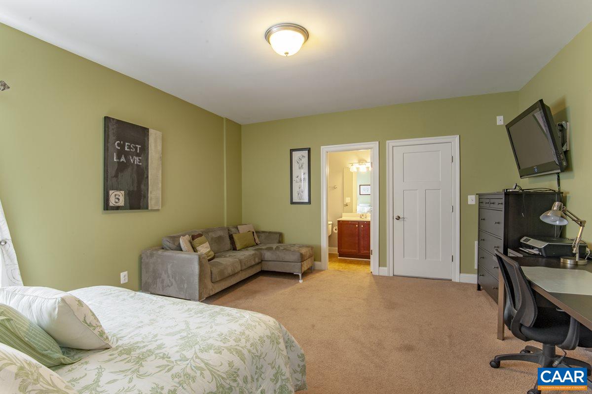 2140 Avinity Loop Charlottesville, VA 22902 - Photo 7 of 26 a bedroom with a bed and furniture