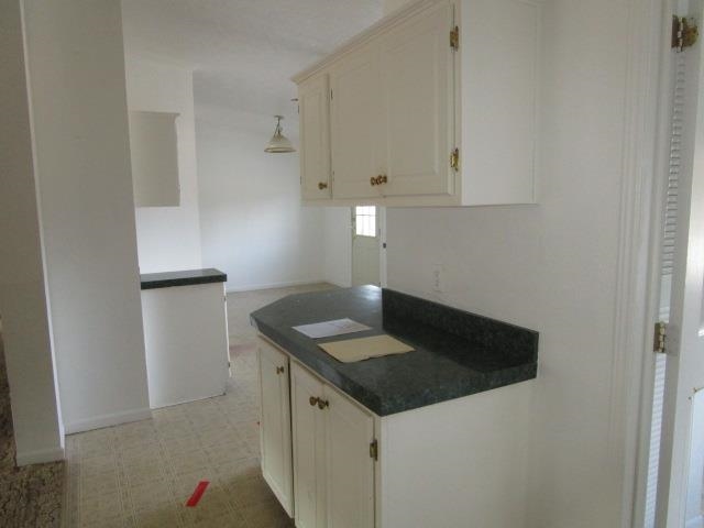 918 Fleeburg Loop Shenandoah, VA 22849 - Photo 29 of 40 a kitchen with granite countertop a sink and a stove