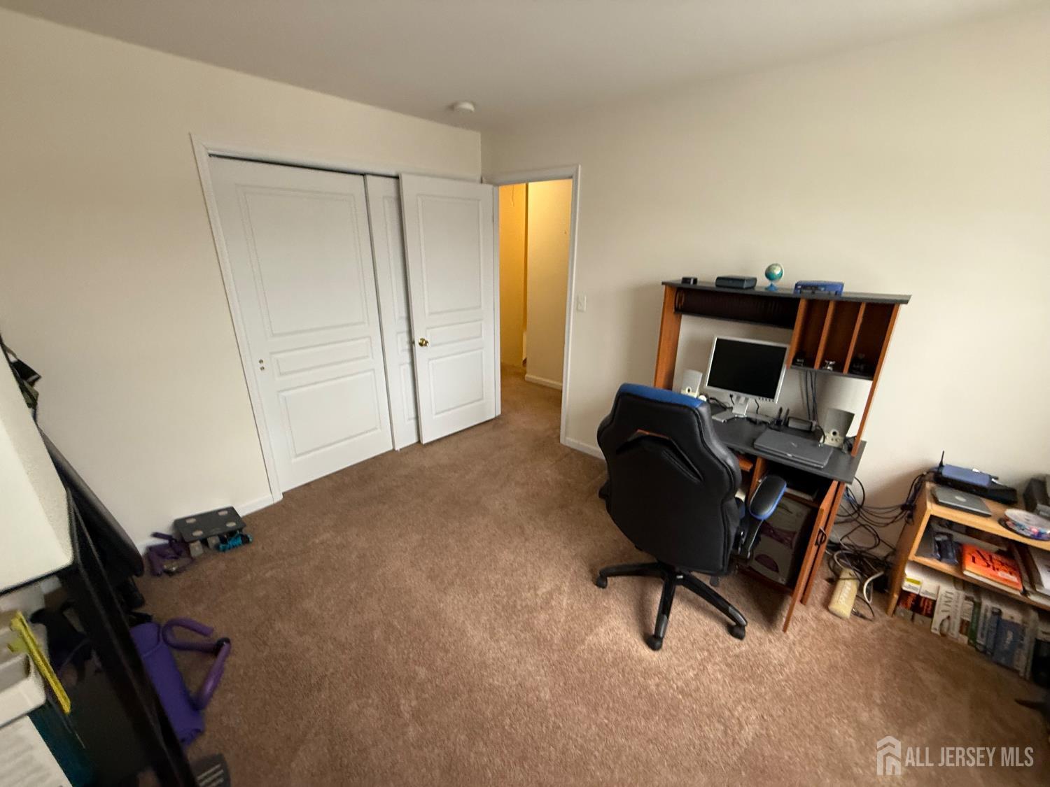 34 Mercer Street Carteret, NJ 07008 - Photo 13 of 17 a room with furniture and a air conditioner vent