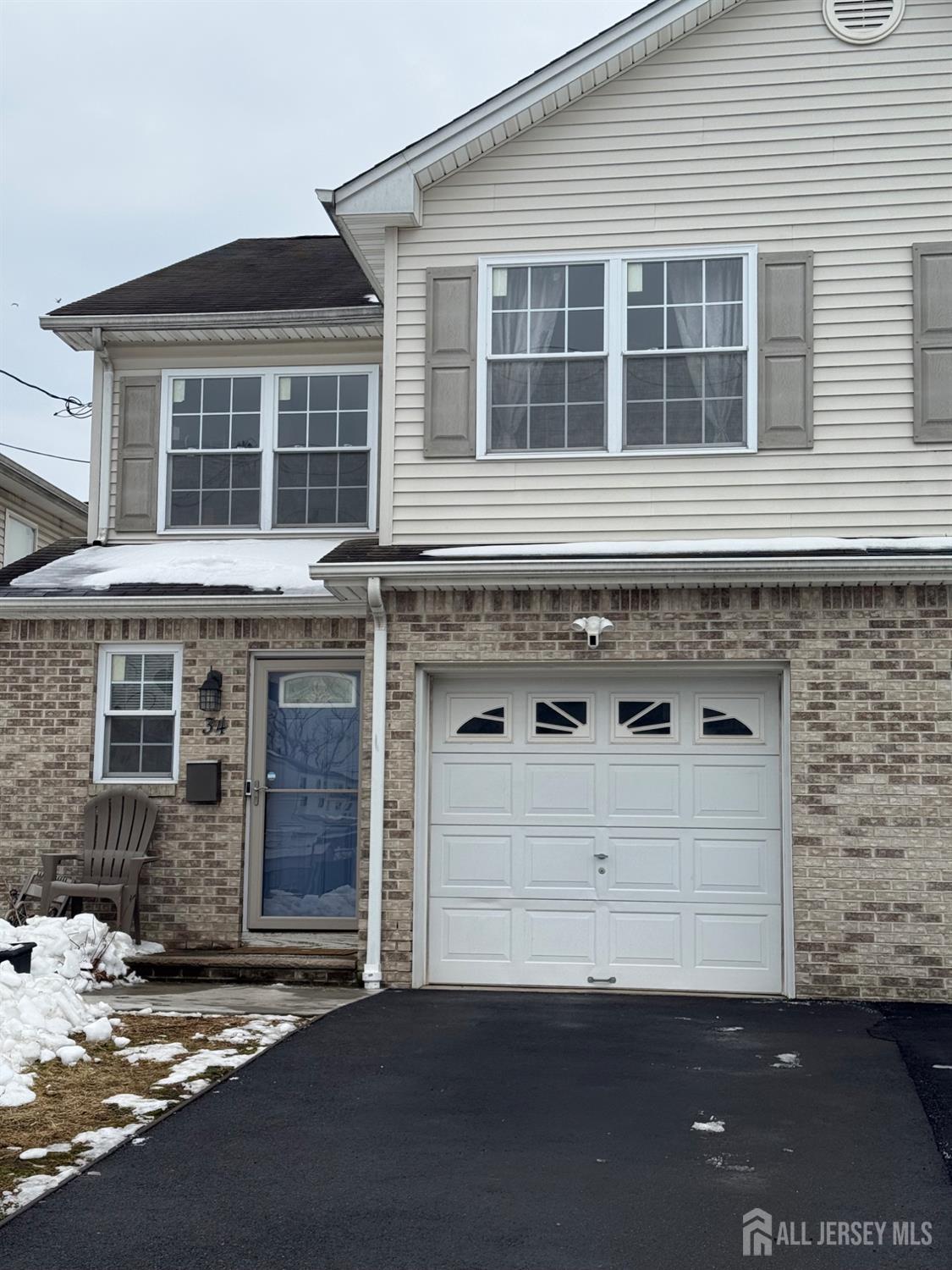 34 Mercer Street Carteret, NJ 07008 - Photo 2 of 17 a front view of a house with a street