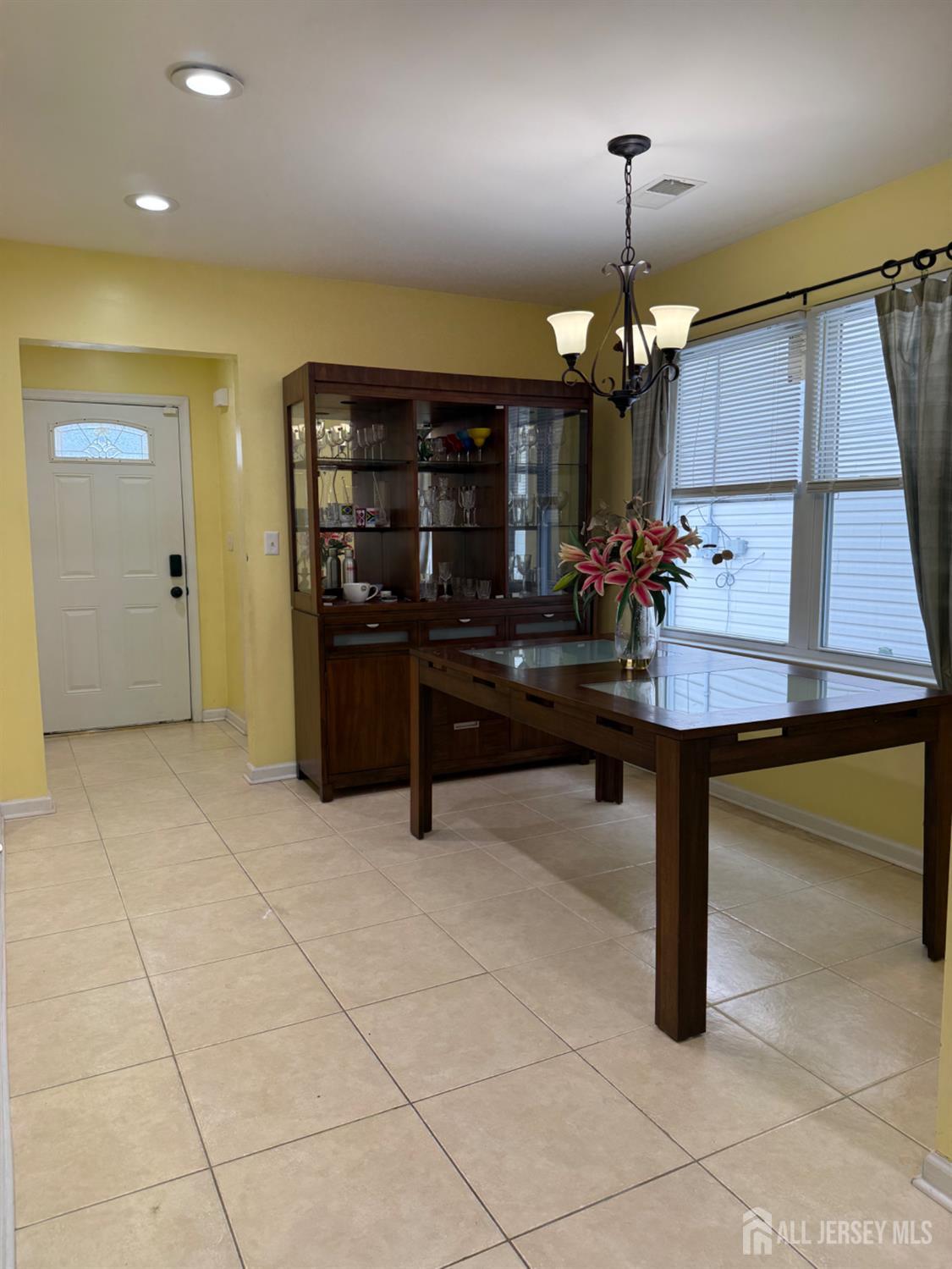 34 Mercer Street Carteret, NJ 07008 - Photo 8 of 17 a hallway with table and a couch
