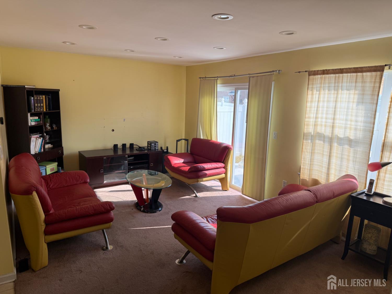 34 Mercer Street Carteret, NJ 07008 - Photo 10 of 17 a living room with furniture and a window