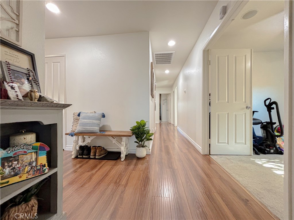 3345 James Court Lancaster, CA 93535 - Photo 13 of 29 a living room with furniture and a fireplace