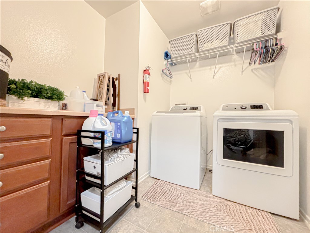 3345 James Court Lancaster, CA 93535 - Photo 19 of 29 a view of a walk in closet