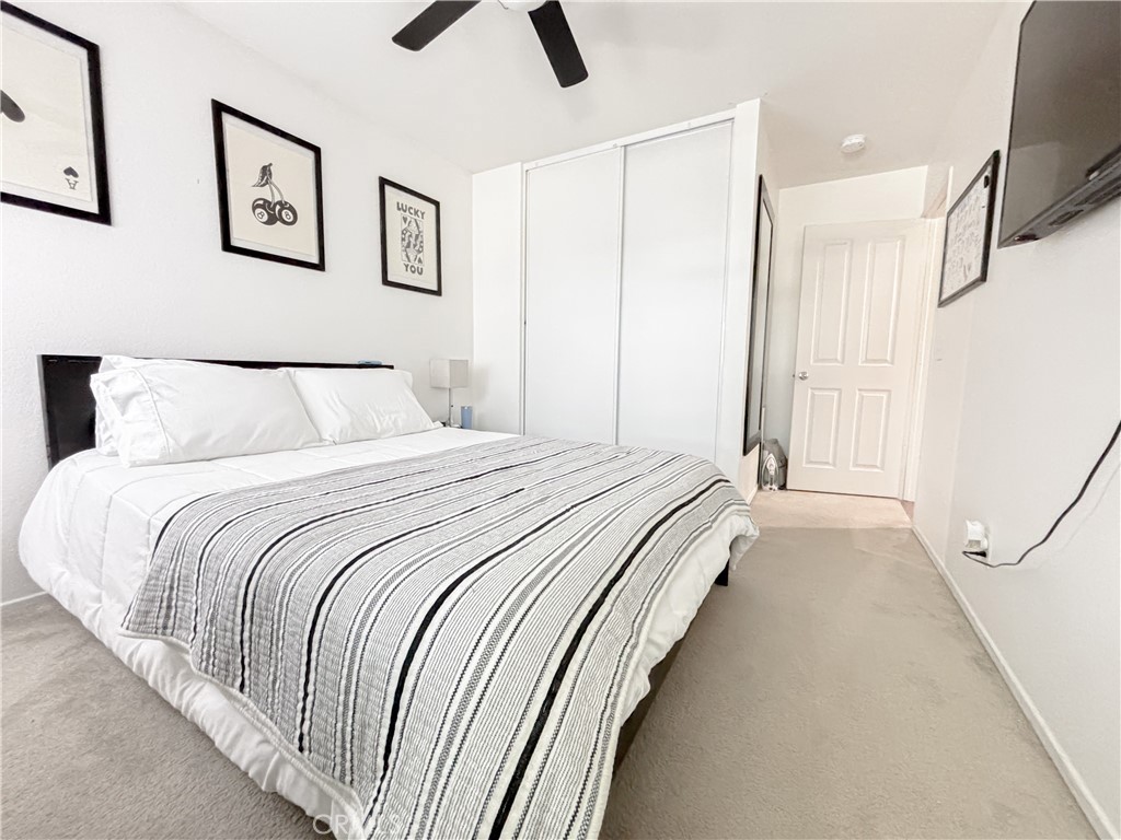 3345 James Court Lancaster, CA 93535 - Photo 23 of 29 a bedroom with a bed and painting on the wall