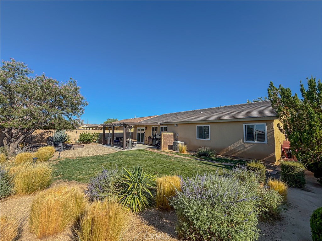 3345 James Court Lancaster, CA 93535 - Photo 28 of 29 a view of a house with a yard