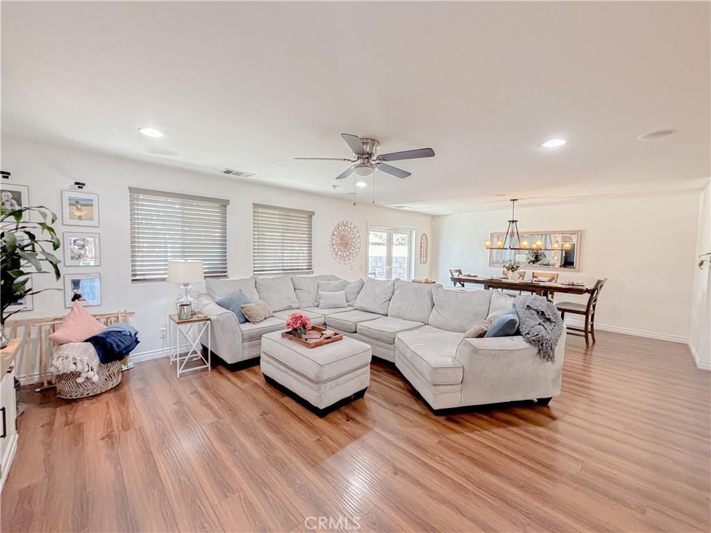 3345 James Court Lancaster, CA 93535 - Photo 9 of 29 a living room with furniture and wooden floor