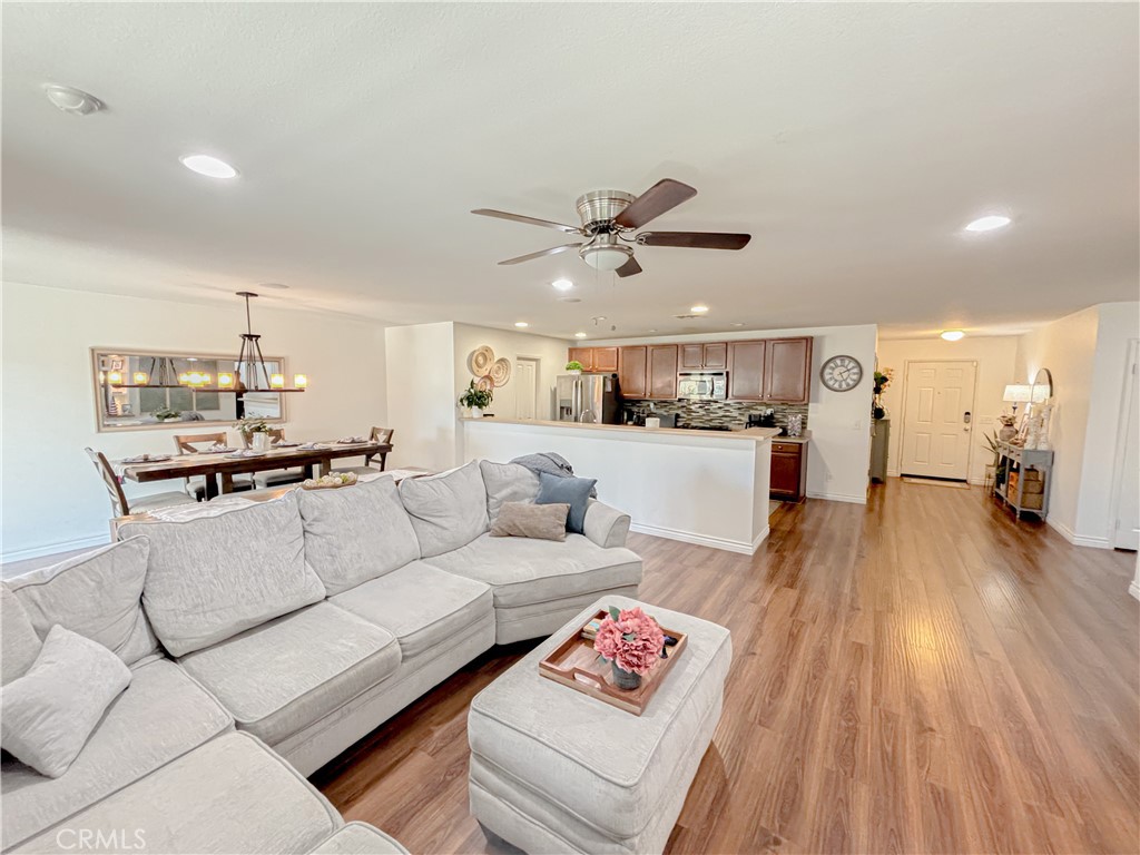 3345 James Court Lancaster, CA 93535 - Photo 10 of 29 a living room with furniture and kitchen view
